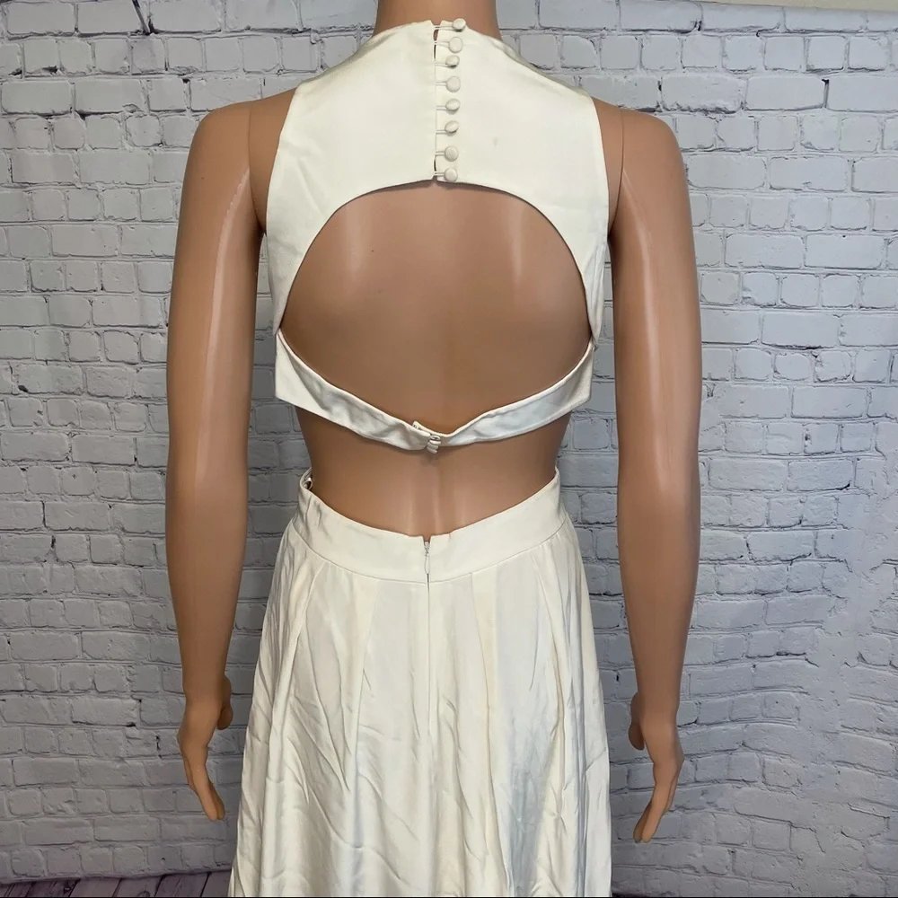 BCBG White Ball Gown w/ statement jewelry & open side slits size 2